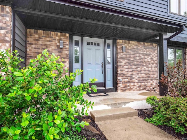 9826 Flag Stone Pl, Fort Wayne, IN 46804 - entrance to property featuring brick siding and covered porch