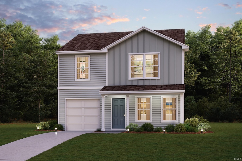 3721 Nordway Rd, Kingsford Heights, IN 46346 - traditional-style house with board and batten siding, driveway, a front lawn, and a garage