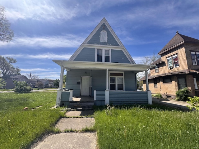 1326 E Pontiac St, Fort Wayne, IN 46806 - view of front of house with covered porch and a front lawn