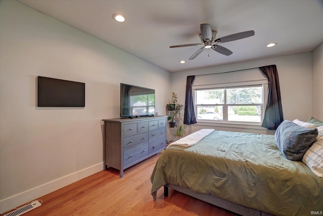 3231 N Kingsley Dr, Bloomington, IN 47404 - bedroom with baseboards, recessed lighting, light wood-style floors, and ceiling fan