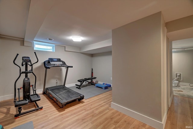 3231 N Kingsley Dr, Bloomington, IN 47404 - workout room featuring light wood-style floors and baseboards