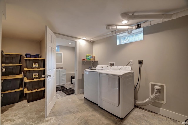 3231 N Kingsley Dr, Bloomington, IN 47404 - washroom featuring washing machine and dryer and baseboards