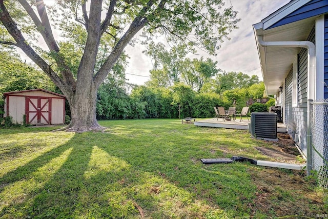 3231 N Kingsley Dr, Bloomington, IN 47404 - view of grassy yard featuring central AC unit
