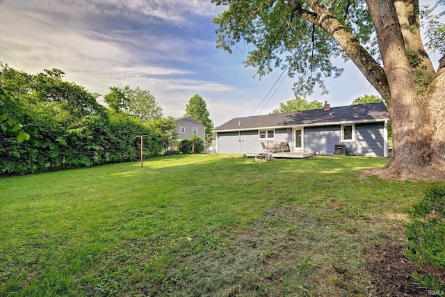 3231 N Kingsley Dr, Bloomington, IN 47404 - view of green lawn featuring a wooden deck