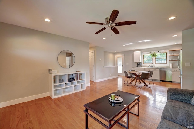 3231 N Kingsley Dr, Bloomington, IN 47404 - living room featuring ceiling fan, baseboards, light wood-type flooring, and recessed lighting