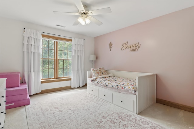 bedroom with baseboards, carpet, and ceiling fan