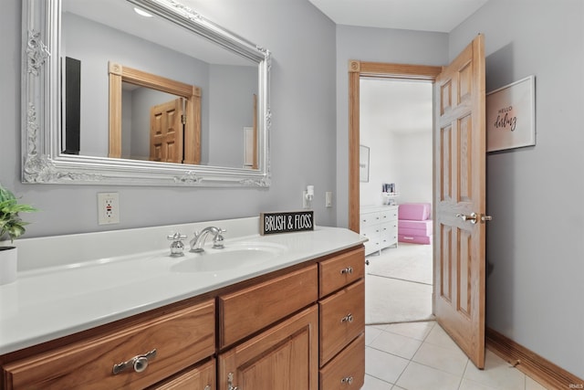 bathroom with vanity and tile patterned flooring