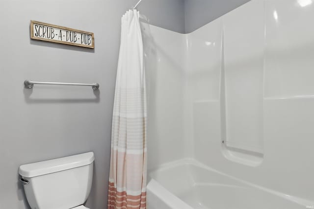 full bathroom featuring shower / bath combo and toilet