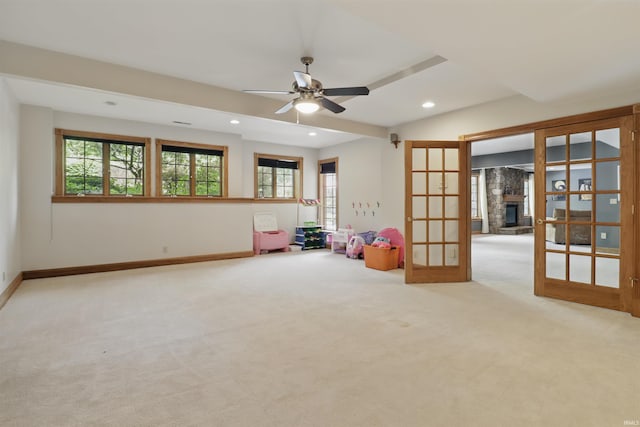 game room with carpet floors, recessed lighting, a ceiling fan, french doors, and baseboards