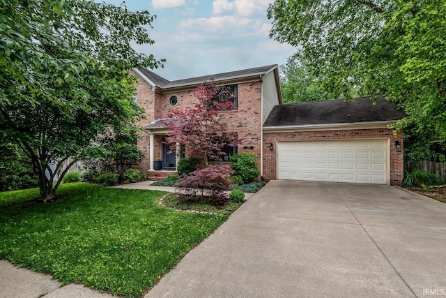 3308 S Daniel Ct, Bloomington, IN 47401 - traditional-style home featuring brick siding, concrete driveway, and a front lawn