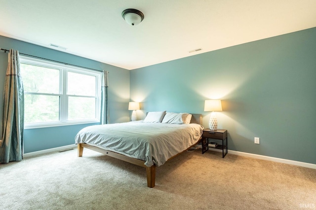 3308 S Daniel Ct, Bloomington, IN 47401 - carpeted bedroom featuring baseboards