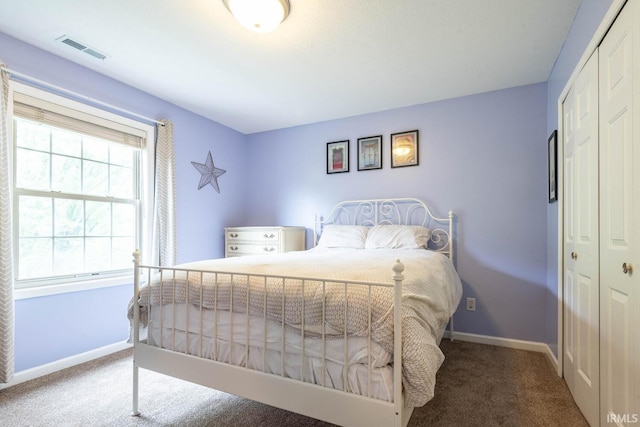 3308 S Daniel Ct, Bloomington, IN 47401 - bedroom with a closet, carpet flooring, and baseboards