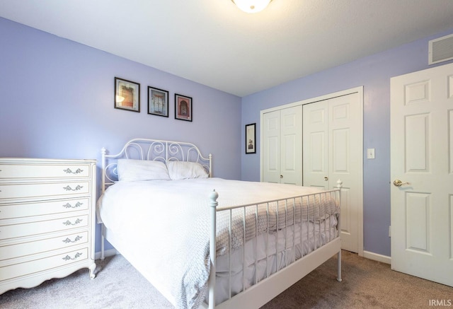 3308 S Daniel Ct, Bloomington, IN 47401 - carpeted bedroom featuring a closet and baseboards