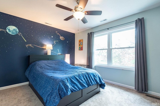 3308 S Daniel Ct, Bloomington, IN 47401 - carpeted bedroom featuring baseboards and ceiling fan