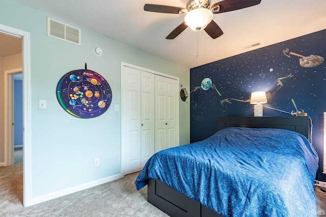 3308 S Daniel Ct, Bloomington, IN 47401 - carpeted bedroom featuring baseboards, a ceiling fan, and a closet