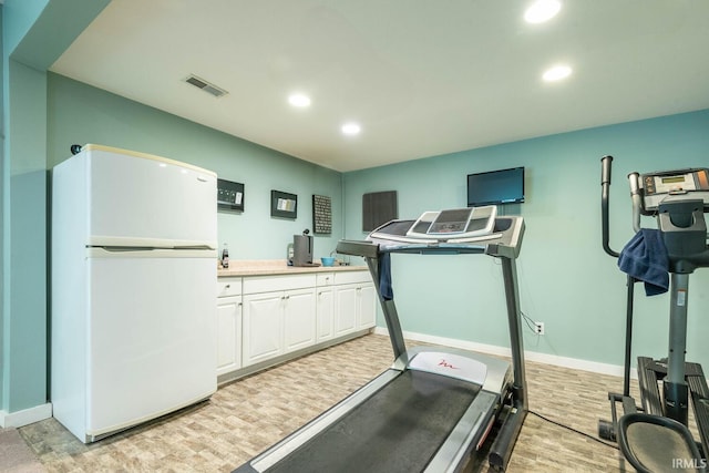 3308 S Daniel Ct, Bloomington, IN 47401 - workout room with light wood-style floors, recessed lighting, and baseboards