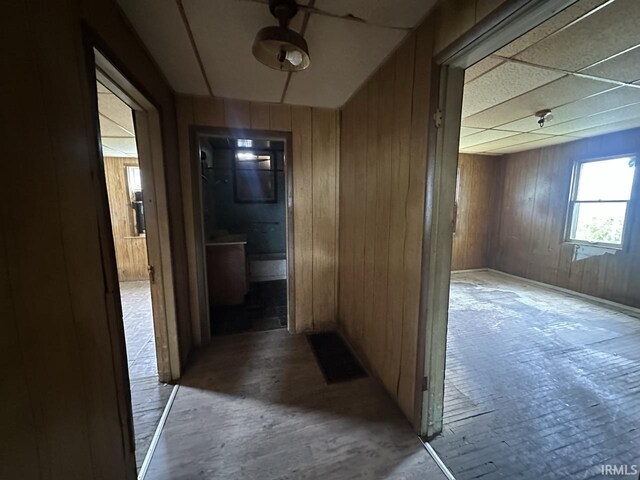1207 Short Columbia St, Frankfort, IN 46041 - hallway with wood walls and wood finished floors