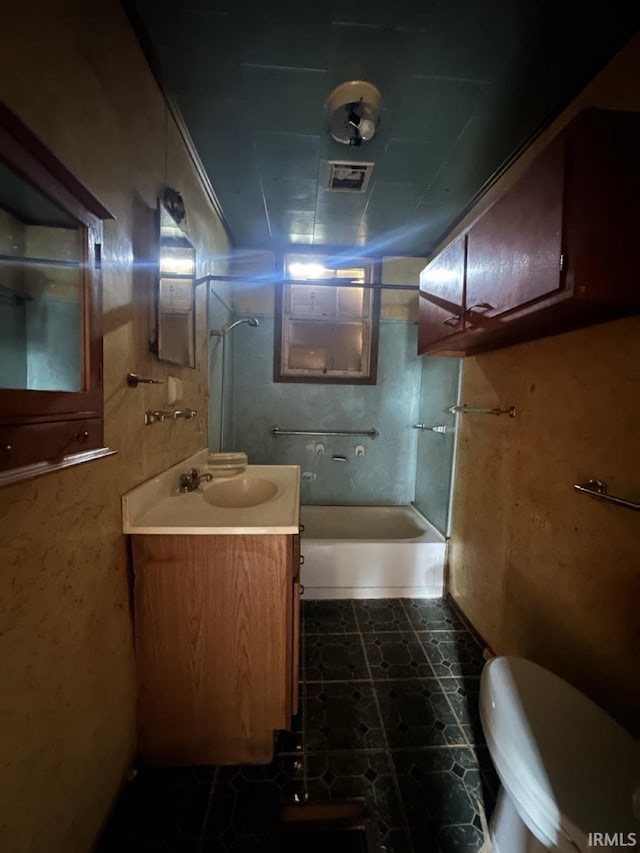 1207 Short Columbia St, Frankfort, IN 46041 - bathroom with toilet, vanity, and shower / bathtub combination