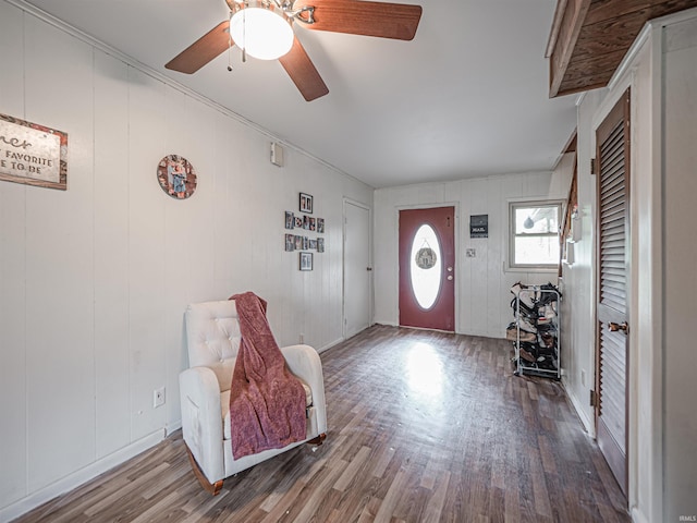 210 S E St, Oakland City, IN 47633 - entrance foyer with a ceiling fan, wood finished floors, and ornamental molding