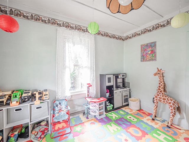 210 S E St, Oakland City, IN 47633 - playroom featuring plenty of natural light