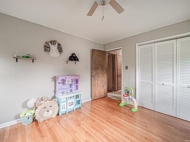 210 S E St, Oakland City, IN 47633 - game room with ceiling fan, wood finished floors, ornamental molding, and baseboards