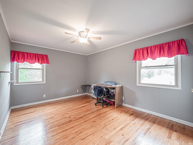 210 S E St, Oakland City, IN 47633 - unfurnished office featuring wood finished floors, ceiling fan, crown molding, and baseboards