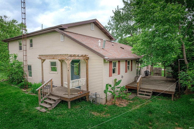 210 S E St, Oakland City, IN 47633 - rear view of house featuring a pergola, a deck, a lawn, and roof with shingles