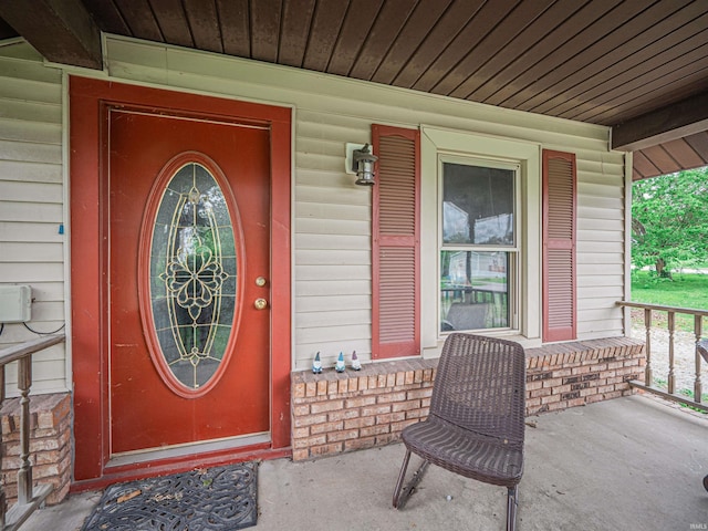 210 S E St, Oakland City, IN 47633 - view of exterior entry with a porch