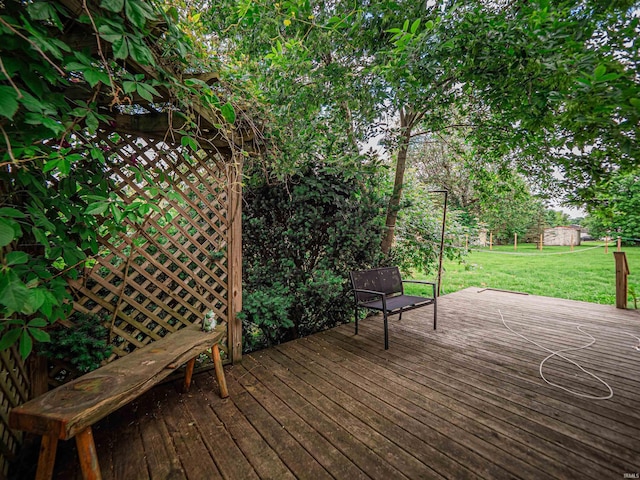 210 S E St, Oakland City, IN 47633 - wooden deck with a lawn