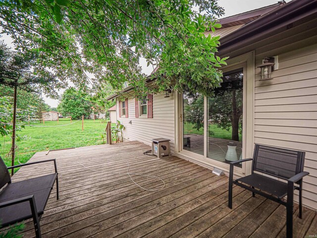 210 S E St, Oakland City, IN 47633 - deck with a yard