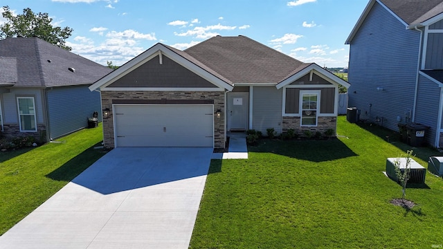 3244 Ashdon Dr, Newburgh, IN 47630 - craftsman house featuring central AC unit, stone siding, driveway, and a garage