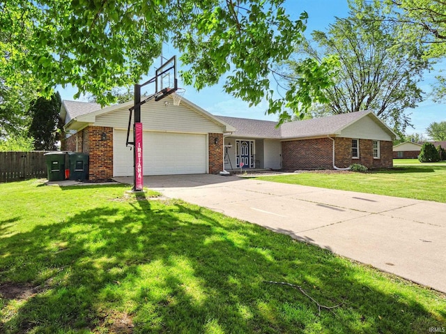 5200 N Leslie Dr, Muncie, IN 47304 - ranch-style house featuring an attached garage, brick siding, and concrete driveway