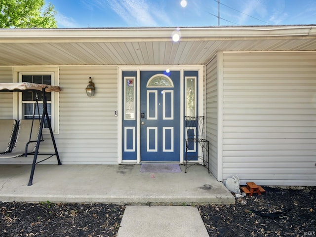 5200 N Leslie Dr, Muncie, IN 47304 - view of exterior entry featuring a porch