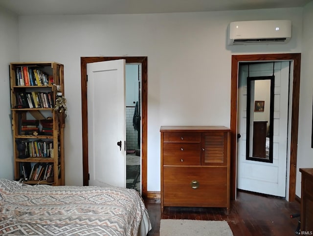 3417 Parkway S Dr, Indianapolis, IN 46201 - bedroom with a wall mounted AC, dark wood finished floors, and baseboards