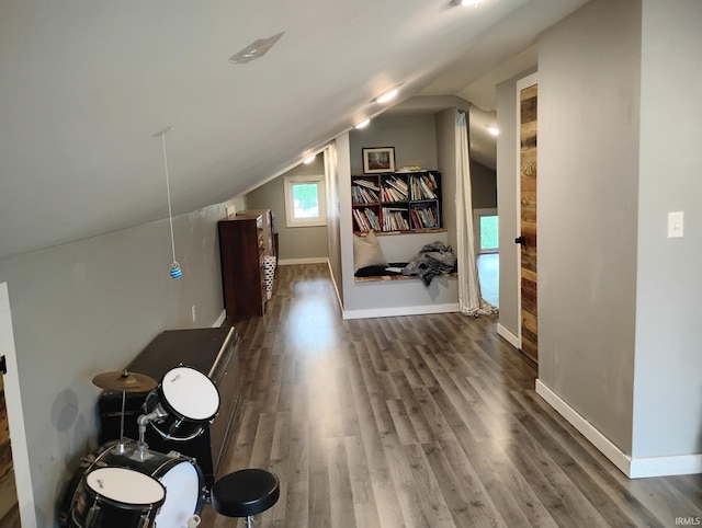 3417 Parkway S Dr, Indianapolis, IN 46201 - additional living space featuring wood finished floors, lofted ceiling, and baseboards