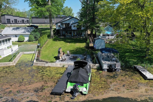 11721 N Elm Grove Dr, Syracuse, IN 46567 - view of grassy yard with a patio