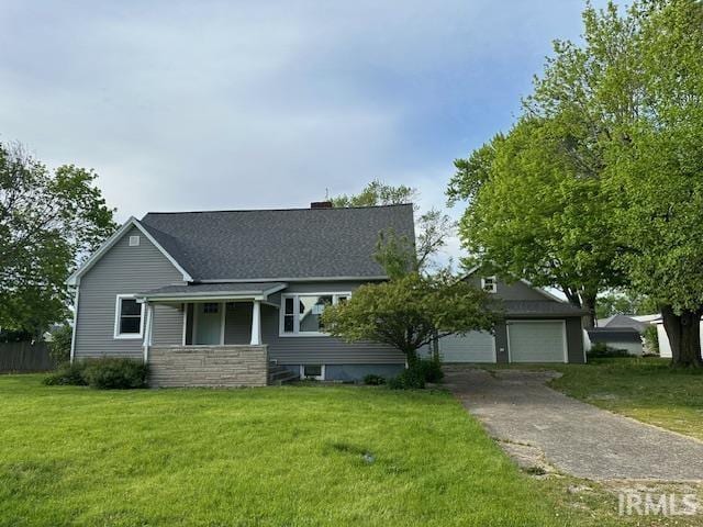 401 E Sycamore St, Converse, IN 46919 - view of front facade with a front yard and a chimney