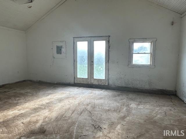 401 E Sycamore St, Converse, IN 46919 - empty room featuring french doors, electric panel, and high vaulted ceiling