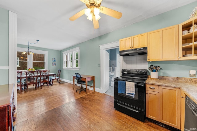 214 Tonti St, South Bend, IN 46617 - kitchen with electric range, under cabinet range hood, dishwashing machine, light brown cabinets, and wood finished floors