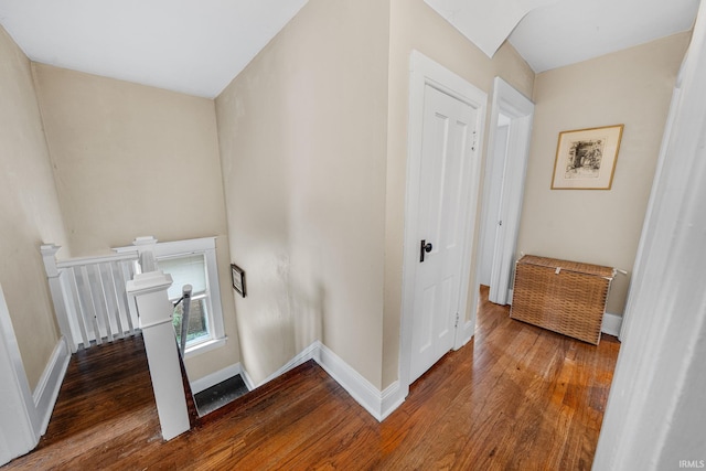 214 Tonti St, South Bend, IN 46617 - corridor featuring an upstairs landing, wood finished floors, and baseboards