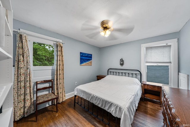 214 Tonti St, South Bend, IN 46617 - bedroom featuring hardwood / wood-style flooring, baseboards, and ceiling fan