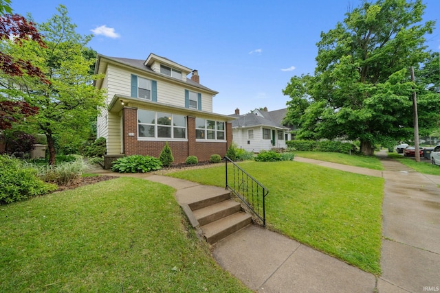 214 Tonti St, South Bend, IN 46617 - traditional style home with brick siding and a front lawn