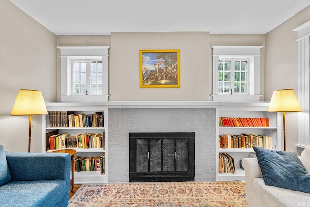 214 Tonti St, South Bend, IN 46617 - living area with built in features and a fireplace