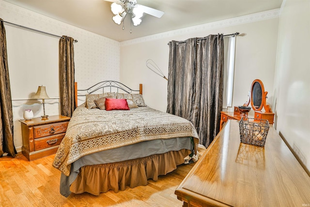 1402 Tanager Dr, Warsaw, IN 46580 - bedroom with light wood finished floors and ceiling fan