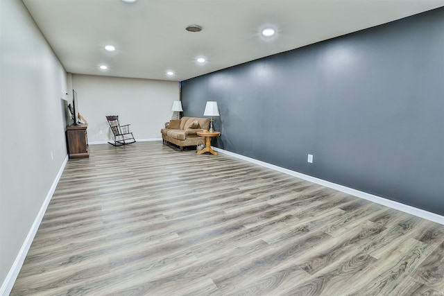 1402 Tanager Dr, Warsaw, IN 46580 - sitting room with wood finished floors, baseboards, and recessed lighting