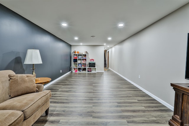1402 Tanager Dr, Warsaw, IN 46580 - sitting room with recessed lighting, baseboards, wood finished floors, and stairs
