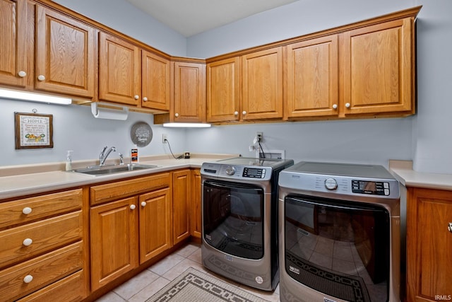 4705 Haven Ct, West Lafayette, IN 47906 - washroom featuring independent washer and dryer, cabinet space, and light tile patterned floors