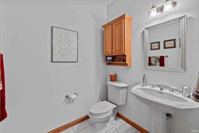 4705 Haven Ct, West Lafayette, IN 47906 - half bath with toilet, baseboards, and tile patterned flooring