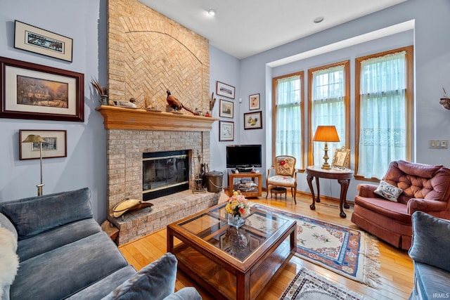 4705 Haven Ct, West Lafayette, IN 47906 - living area with wood-type flooring and a fireplace