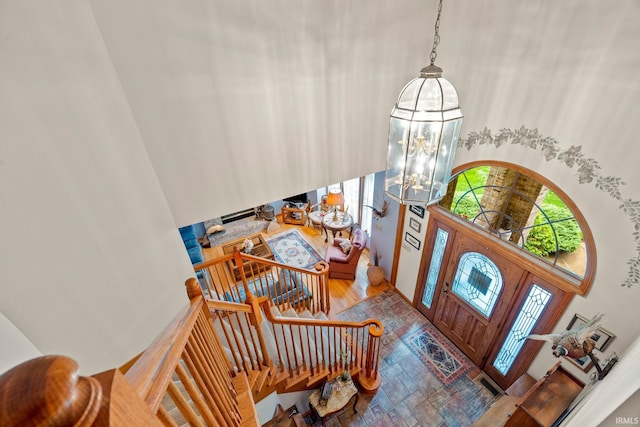 4705 Haven Ct, West Lafayette, IN 47906 - entryway with a towering ceiling, wood finished floors, and a chandelier